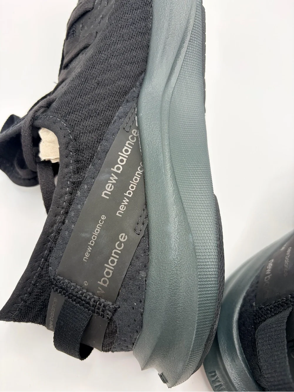 New Balance Women’s Black Knit Slip-On Sneakers with Dark Gray Sole